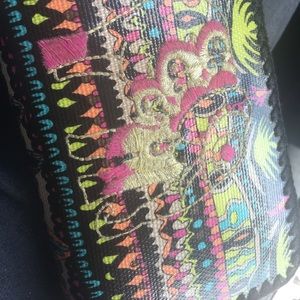 Unique sakroots wallet with elephant design